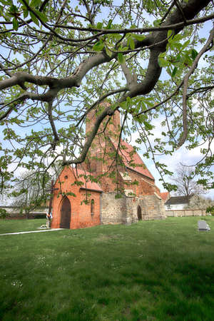 WROCLAW, POLAND - MAY 01, 2021: Roman Catholic Church of the Assumption of the Blessed Virgin Mary (15th century) in Wilczkow near Wroclaw, Poland, Europe.の写真素材