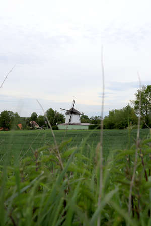 WROCLAW, POLAND - MAY 24, 2021: Dutch windmill from 1830 located on the edge of the village of Gogolow at the foot of the Sleza Mountain, in south-western Poland, Europe.のeditorial素材