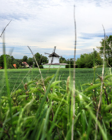 WROCLAW, POLAND - MAY 24, 2021: Dutch windmill from 1830 located on the edge of the village of Gogolow at the foot of the Sleza Mountain, in south-western Poland, Europe.のeditorial素材