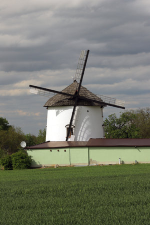 WROCLAW, POLAND - MAY 24, 2021: Dutch windmill from 1830 located on the edge of the village of Gogolow at the foot of the Sleza Mountain, in south-western Poland, Europe.のeditorial素材