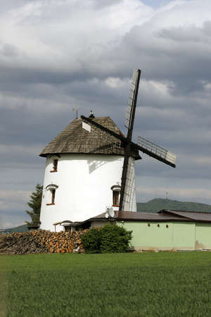 WROCLAW, POLAND - MAY 24, 2021: Dutch windmill from 1830 located on the edge of the village of Gogolow at the foot of the Sleza Mountain, in south-western Poland, Europe.のeditorial素材