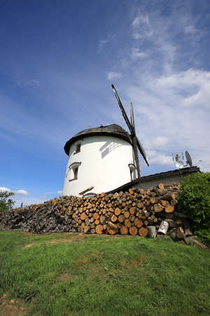 WROCLAW, POLAND - MAY 24, 2021: Dutch windmill from 1830 located on the edge of the village of Gogolow at the foot of the Sleza Mountain, in south-western Poland, Europe.のeditorial素材