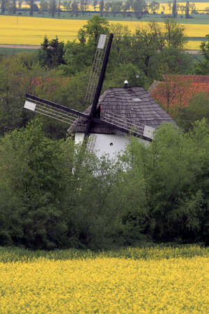 WROCLAW, POLAND - MAY 24, 2021: Dutch windmill from 1830 located on the edge of the village of Gogolow at the foot of the Sleza Mountain, in south-western Poland, Europe.のeditorial素材