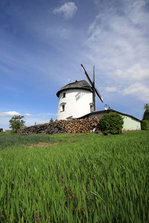 WROCLAW, POLAND - MAY 24, 2021: Dutch windmill from 1830 located on the edge of the village of Gogolow at the foot of the Sleza Mountain, in south-western Poland, Europe.のeditorial素材