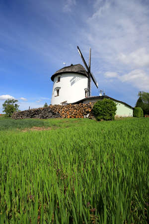WROCLAW, POLAND - MAY 24, 2021: Dutch windmill from 1830 located on the edge of the village of Gogolow at the foot of the Sleza Mountain, in south-western Poland, Europe.のeditorial素材