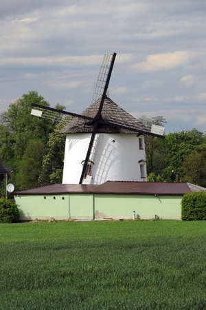 WROCLAW, POLAND - MAY 24, 2021: Dutch windmill from 1830 located on the edge of the village of Gogolow at the foot of the Sleza Mountain, in south-western Poland, Europe.のeditorial素材