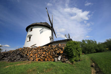 WROCLAW, POLAND - MAY 24, 2021: Dutch windmill from 1830 located on the edge of the village of Gogolow at the foot of the Sleza Mountain, in south-western Poland, Europe.のeditorial素材