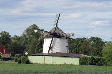 WROCLAW, POLAND - MAY 24, 2021: Dutch windmill from 1830 located on the edge of the village of Gogolow at the foot of the Sleza Mountain, in south-western Poland, Europe.のeditorial素材