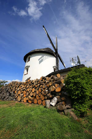WROCLAW, POLAND - MAY 24, 2021: Dutch windmill from 1830 located on the edge of the village of Gogolow at the foot of the Sleza Mountain, in south-western Poland, Europe.のeditorial素材
