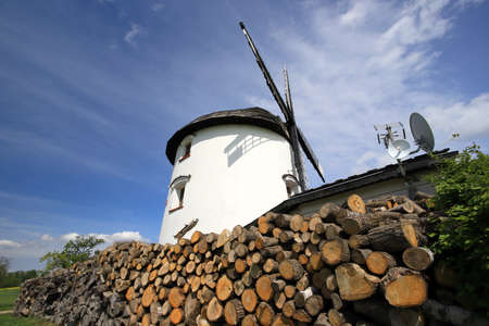 WROCLAW, POLAND - MAY 24, 2021: Dutch windmill from 1830 located on the edge of the village of Gogolow at the foot of the Sleza Mountain, in south-western Poland, Europe.のeditorial素材