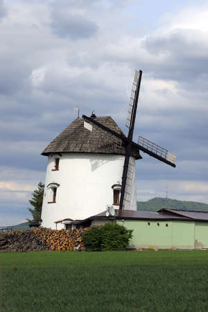 WROCLAW, POLAND - MAY 24, 2021: Dutch windmill from 1830 located on the edge of the village of Gogolow at the foot of the Sleza Mountain, in south-western Poland, Europe.のeditorial素材