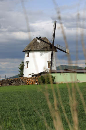 WROCLAW, POLAND - MAY 24, 2021: Dutch windmill from 1830 located on the edge of the village of Gogolow at the foot of the Sleza Mountain, in south-western Poland, Europe.のeditorial素材