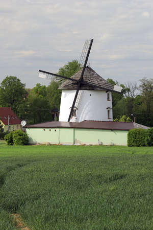 WROCLAW, POLAND - MAY 24, 2021: Dutch windmill from 1830 located on the edge of the village of Gogolow at the foot of the Sleza Mountain, in south-western Poland, Europe.のeditorial素材
