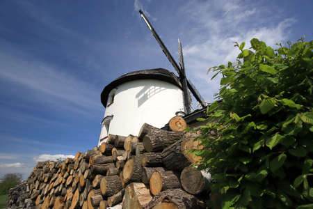 WROCLAW, POLAND - MAY 24, 2021: Dutch windmill from 1830 located on the edge of the village of Gogolow at the foot of the Sleza Mountain, in south-western Poland, Europe.のeditorial素材