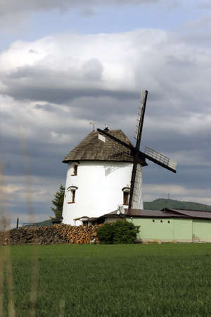 WROCLAW, POLAND - MAY 24, 2021: Dutch windmill from 1830 located on the edge of the village of Gogolow at the foot of the Sleza Mountain, in south-western Poland, Europe.のeditorial素材