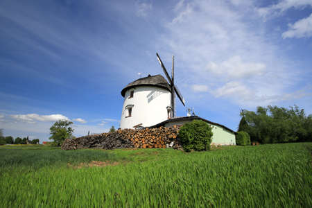 WROCLAW, POLAND - MAY 24, 2021: Dutch windmill from 1830 located on the edge of the village of Gogolow at the foot of the Sleza Mountain, in south-western Poland, Europe.のeditorial素材