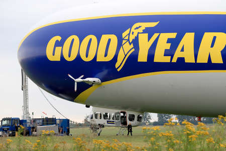 WROCLAW, POLAND - AUGUST 01, 2021: The legendary Goodyear Blimp airship waiting for passengers. Airport in Szymanow near Wroclaw, Poland, Europe.のeditorial素材