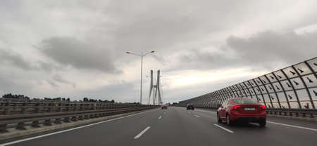 WROCLAW, POLAND - AUGUST 01, 2021: The Redzinski Bridge is a cable-stayed bridge spanning the Oder river in Wroclaw, Poland. The tallest and longest bridge in Poland.のeditorial素材