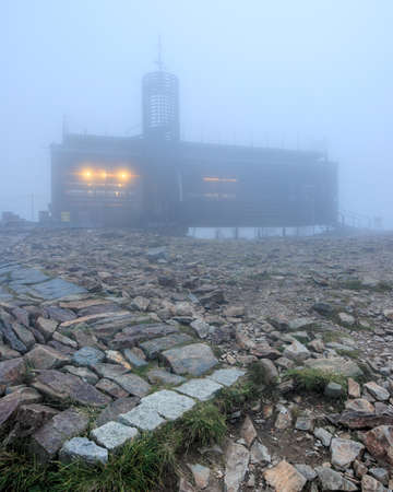 Sniezka Mountain (the highest peak of the Karkonosze and the Sudetes) during a foggy afternoon. Giant Mountains, Poland, Europe.の写真素材