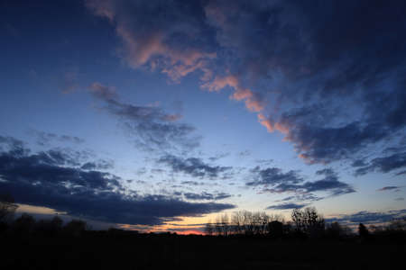 Beautiful sunset and clouds on the last day of april near Wroclaw, Poland, Europe.の写真素材
