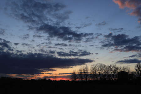 Beautiful sunset and clouds on the last day of april near Wroclaw, Poland, Europe.の写真素材
