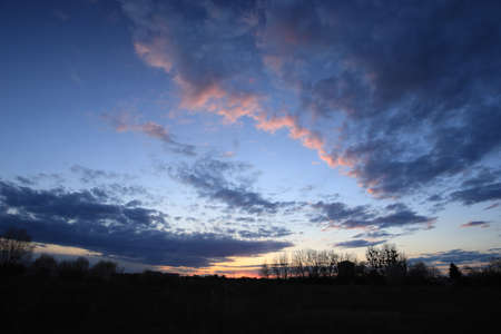 Beautiful sunset and clouds on the last day of april near Wroclaw, Poland, Europe.の写真素材