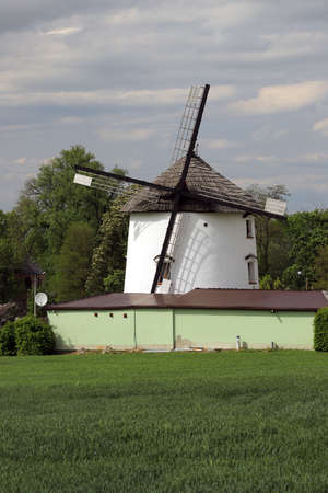 WROCLAW, POLAND - MAY 24, 2021: Dutch windmill from 1830 located on the edge of the village of Gogolow at the foot of the Sleza Mountain, in south-western Poland, Europe.のeditorial素材