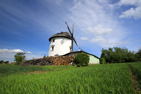 WROCLAW, POLAND - MAY 24, 2021: Dutch windmill from 1830 located on the edge of the village of Gogolow at the foot of the Sleza Mountain, in south-western Poland, Europe.のeditorial素材