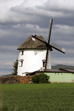 Dutch windmill from 1830 located on the edge of the village of Gogolow at the foot of the Sleza Mountain, in south-western Poland, Europe.の写真素材