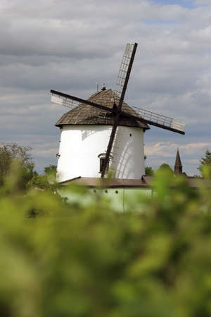 Dutch windmill from 1830 located on the edge of the village of Gogolow at the foot of the Sleza Mountain, in south-western Poland, Europe.の写真素材