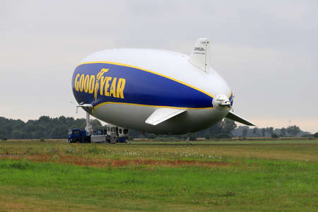 WROCLAW, POLAND - AUGUST 01, 2021: The legendary Goodyear Blimp airship waiting for passengers. Airport in Szymanow near Wroclaw, Poland, Europe.のeditorial素材