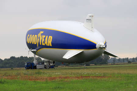 WROCLAW, POLAND - AUGUST 01, 2021: The legendary Goodyear Blimp airship waiting for passengers. Airport in Szymanow near Wroclaw, Poland, Europe.のeditorial素材