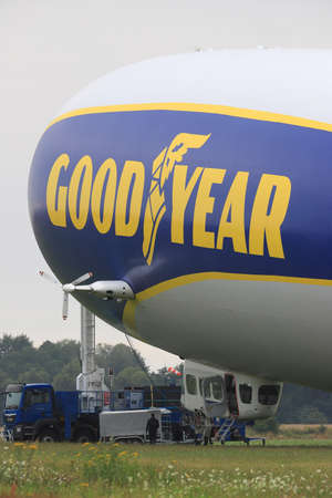 WROCLAW, POLAND - AUGUST 01, 2021: The legendary Goodyear Blimp airship waiting for passengers. Airport in Szymanow near Wroclaw, Poland, Europe.のeditorial素材