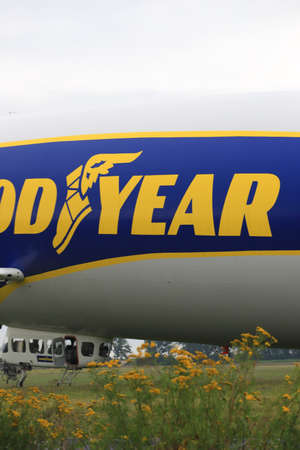 WROCLAW, POLAND - AUGUST 01, 2021: The legendary Goodyear Blimp airship waiting for passengers. Airport in Szymanow near Wroclaw, Poland, Europe.のeditorial素材
