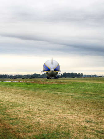 WROCLAW, POLAND - AUGUST 01, 2021: The legendary Goodyear Blimp airship waiting for passengers. Airport in Szymanow near Wroclaw, Poland, Europe.のeditorial素材