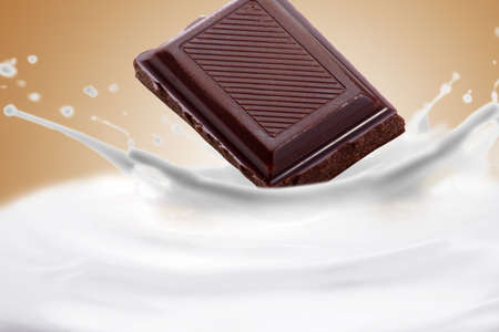 Fantastical milk and chocolate background. Drops, waves, splashes.の写真素材