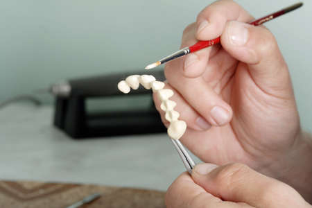 Dental background: work in clinic (operation, tooth replacement)
の写真素材