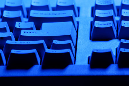 Electronic background: keyboard in blue shine