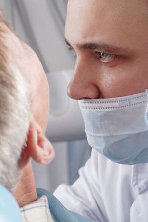 Dental background: work in clinic (operation, tooth replacement)の写真素材