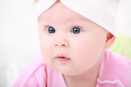Beautiful baby. Shot in studio. Isolated on white.の写真素材