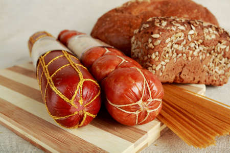 Tasty sausages on the linen background.の写真素材