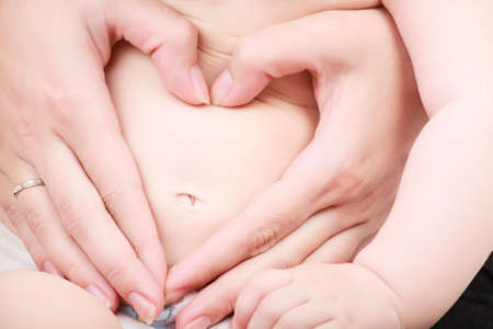 A hand of a mather. Shot in studio.の写真素材