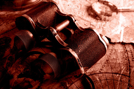 Old fashioned objects on the vintage mapの写真素材