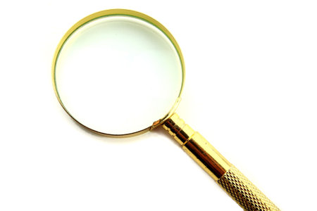 Magnifying lens isolated on whiteの写真素材