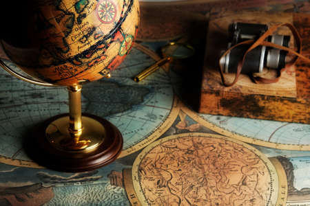 Old fashioned objects on the vintage mapの写真素材