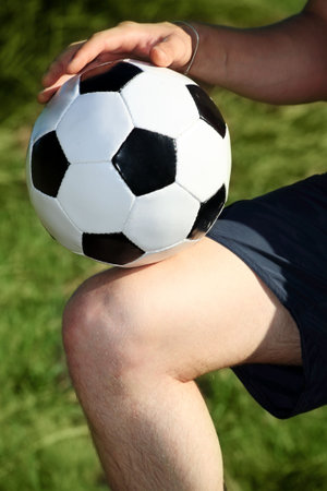 Sport background: close up of a soccer ballの写真素材