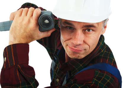 Muscular professional man in a builder uniform with tools.の写真素材