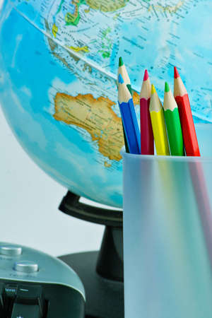 Writing materials: coloured pencils background.の写真素材