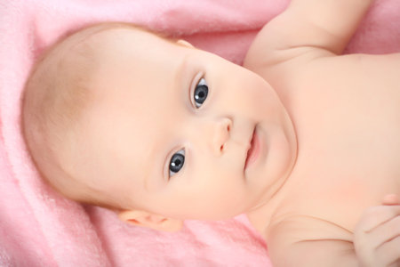Beautiful baby. Shot in studio. Isolated on white.