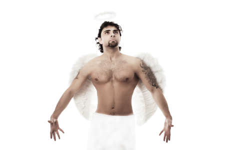 Handsome male angel. Shot in a studio.の写真素材